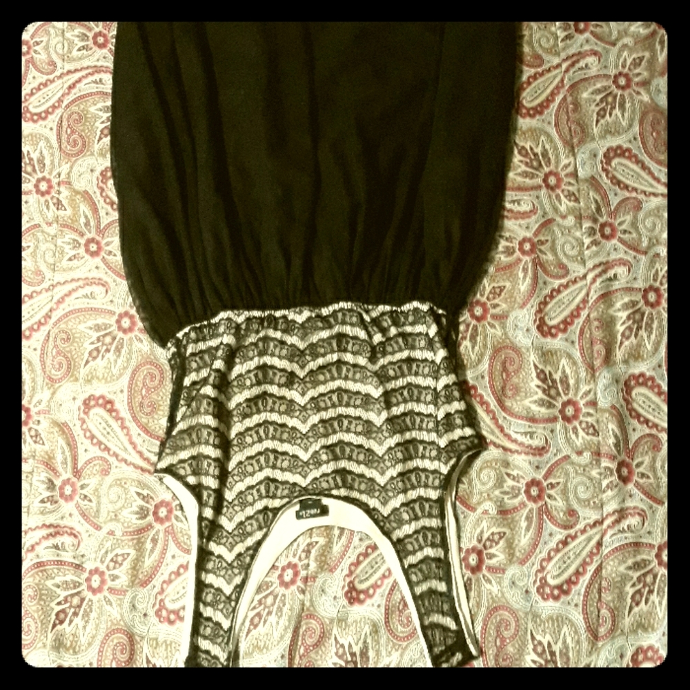 An unused black lace rue 21 dress.